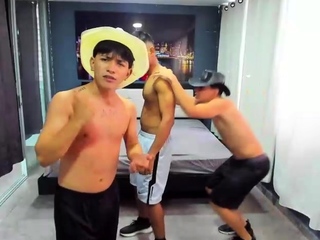 Two randy gay fellas giving blowjobs in group sex action