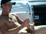Young jock Matt H masturbates his huge dick outdoor and cums