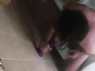 SUCKING A DILDO